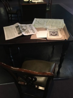 Desks and papers in the exhibition